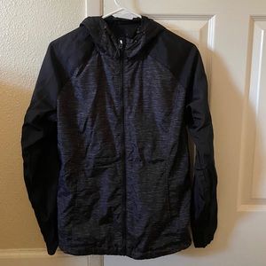 Black and grey windbreaker